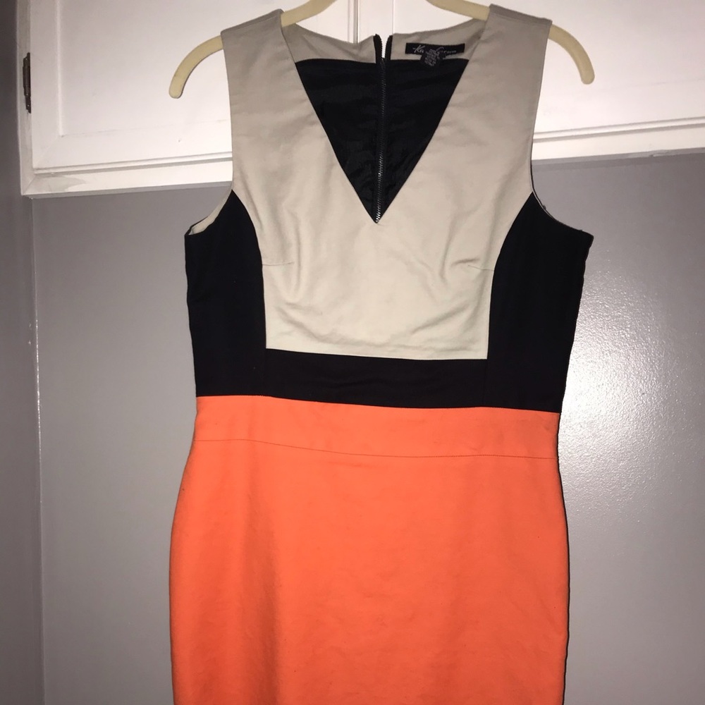 Orange cream and black dress